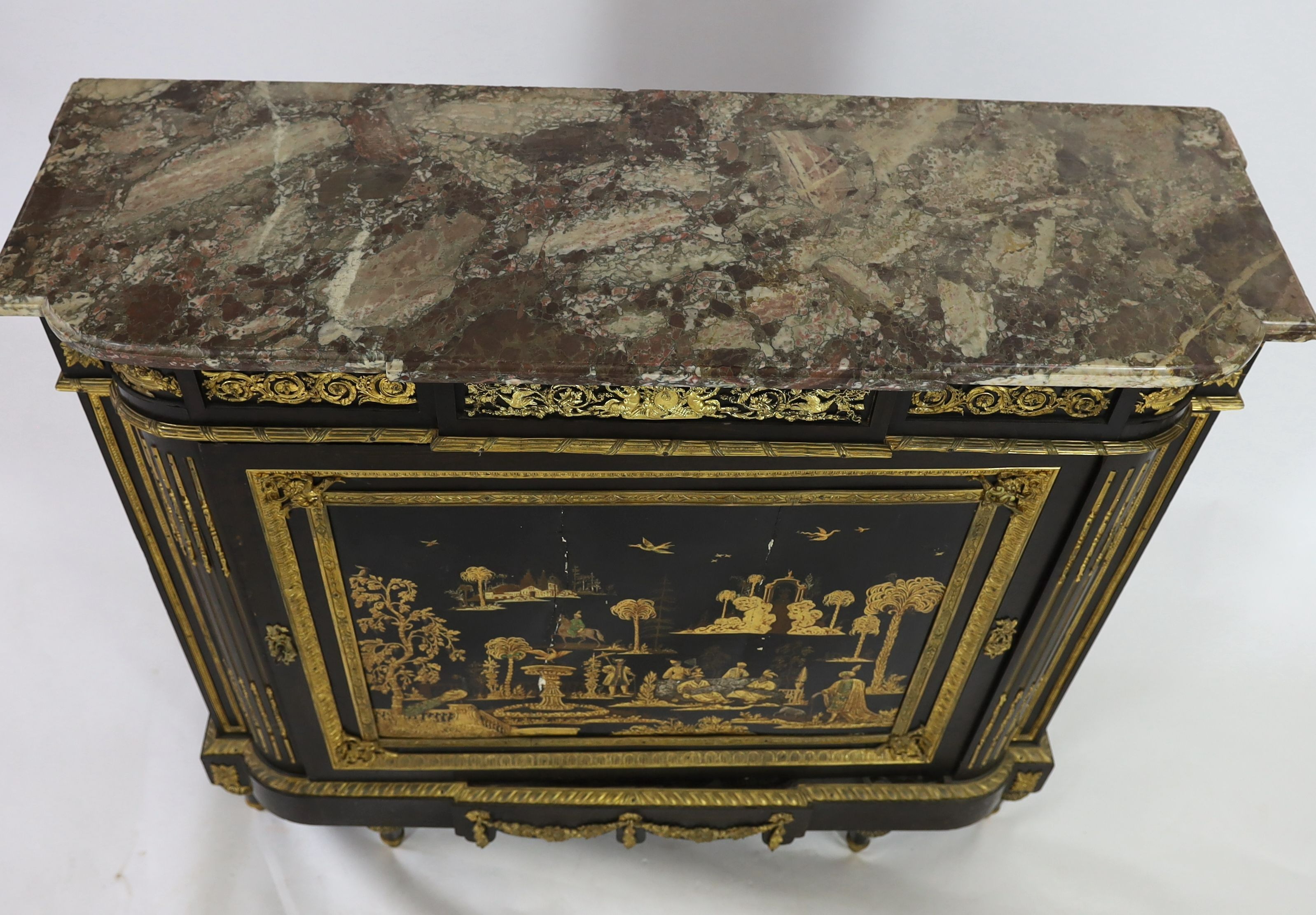 A 19th century French Louis XVI style ormolu mounted ebonised side cabinet, W.134cm D.46cm H.122cm